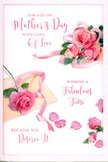This Mother's Day card is depicted as if someone has gently spread a small bouquet across a sheet of fine paper, capturing the quiet charm of Chingford's leafy avenues. At the heart of the design is a relaxed grouping of pink roses, each flower full and rounded, with petals that curl outward in soft, layered waves. The colours shift from a pale, almost creamy blush at the edges to richer pink tones near the centre, reminiscent of roses just opened in a garden close to Epping Forest. A few petals have separated from the blooms and rest scattered across the white background, giving a sense of lightness, as though they have just floated down after a loving touch. The lighting is soft and diffused, suggesting an overcast yet gentle day, which enhances the roses' velvety appearance and casts the faintest shadows beneath them. A slender pastel ribbon meanders around the main cluster, tying the imagery together the way a florist would finish a hand-tied bouquet. Across the upper or central portion of the card, elegant, swirling script spells out a caring Mother's Day message, the letters flowing with the same grace as the petal edges. The composition feels personal and tender, ideal to accompany a fresh floral delivery to a home near Chingford Mount or a cosy spot along Sewardstone Road, where the card's soft colours, drifting petals, and heartfelt words come together to honour a mother's love in a quiet, genuine way.